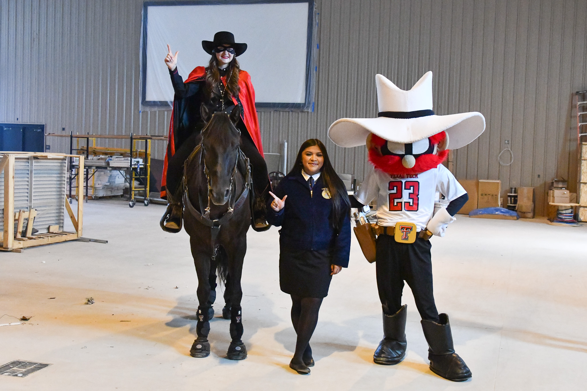 Masked rider and raider red with student
