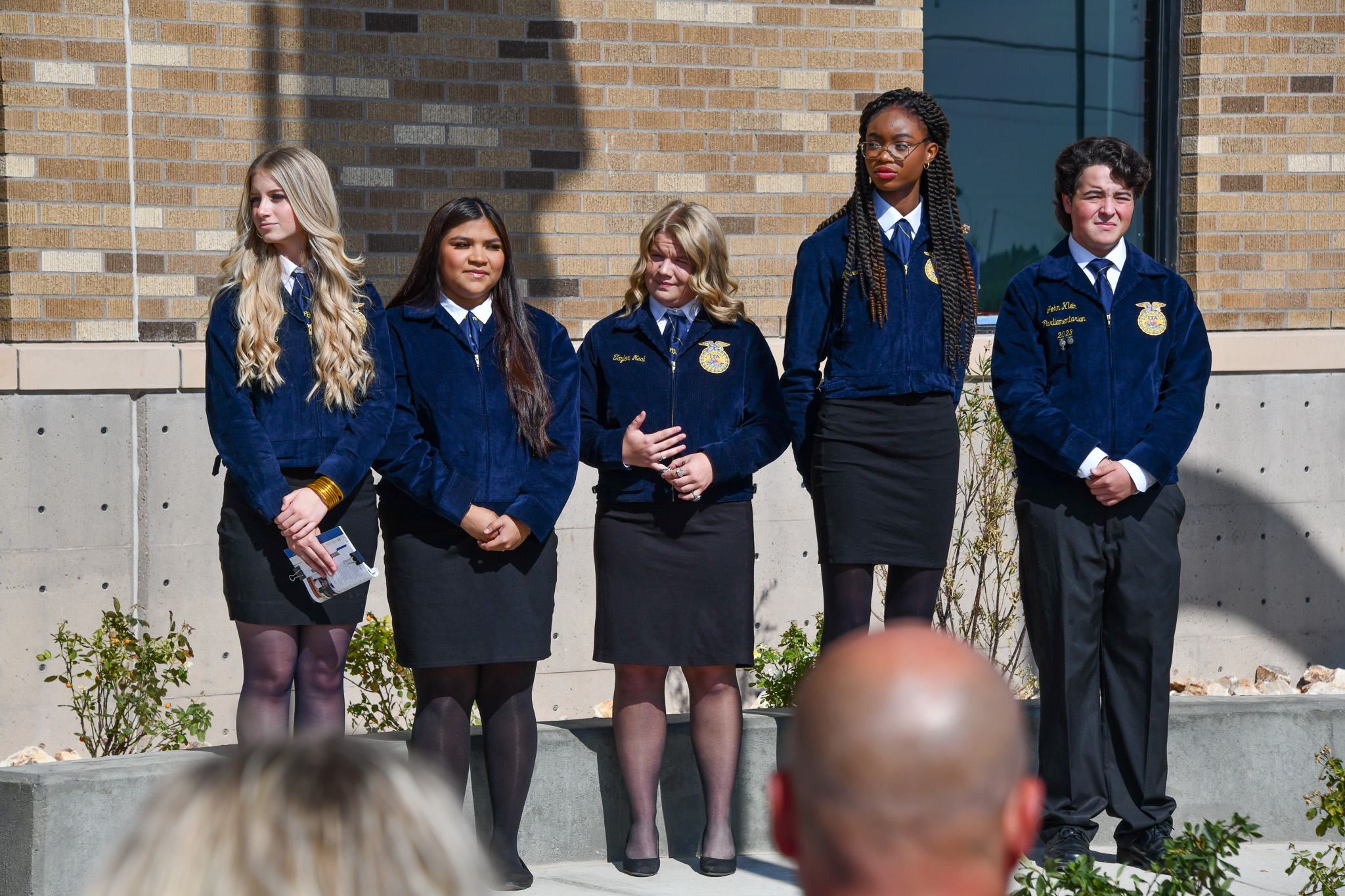 Ag students standing at ribbon cutting ceremony