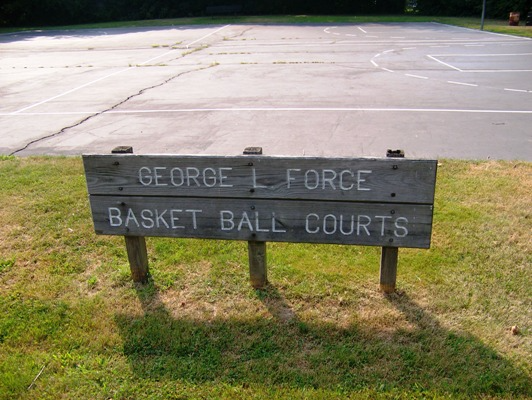 "George L. Force Basketball Courts" sign