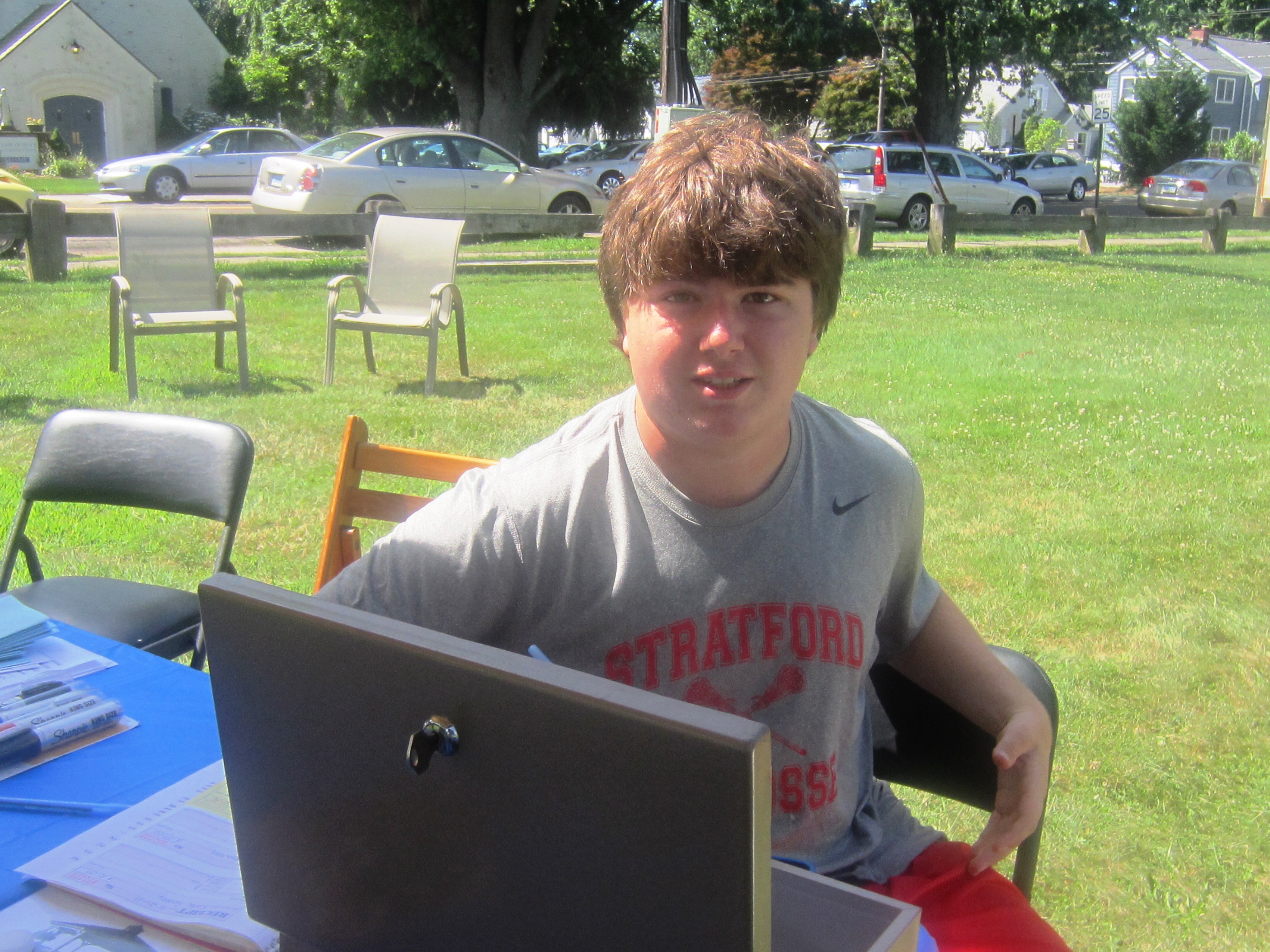 A teenager at a fundraising event