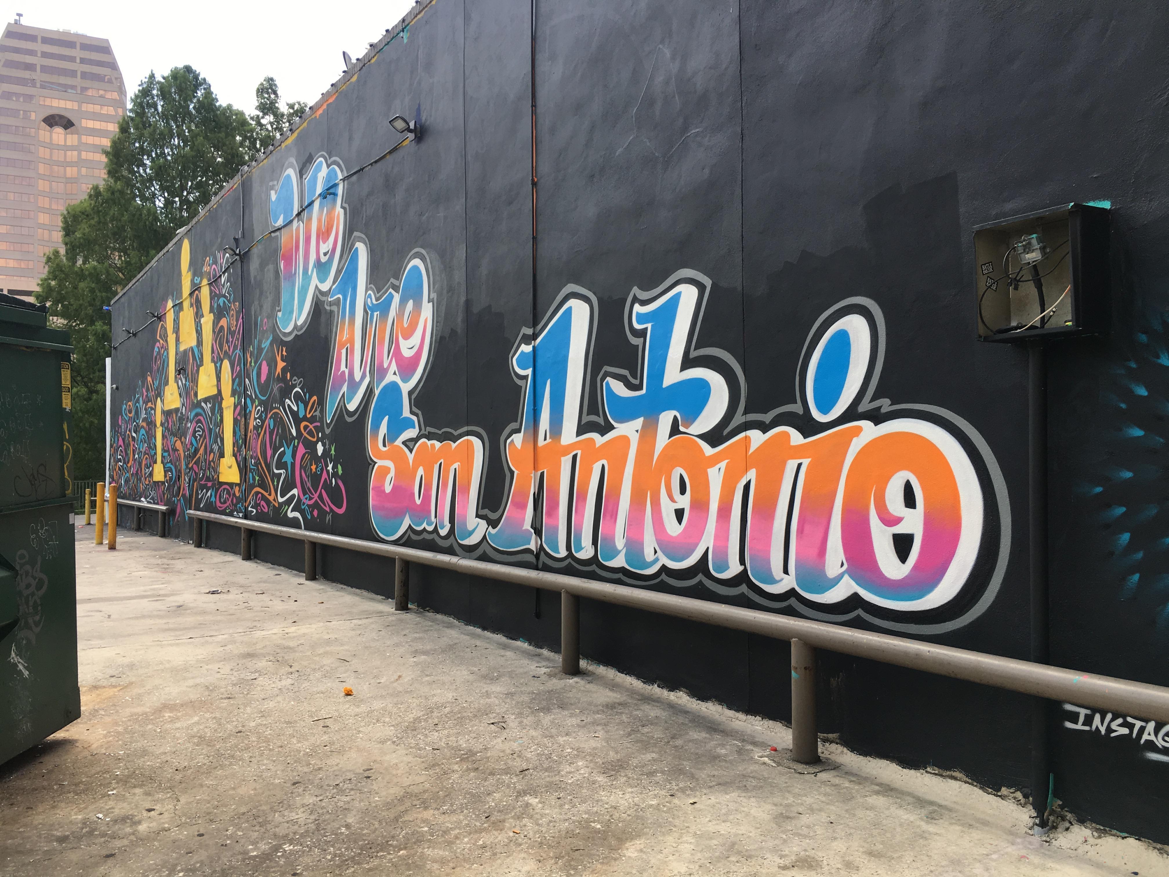 Black Wall San Antonio sign
