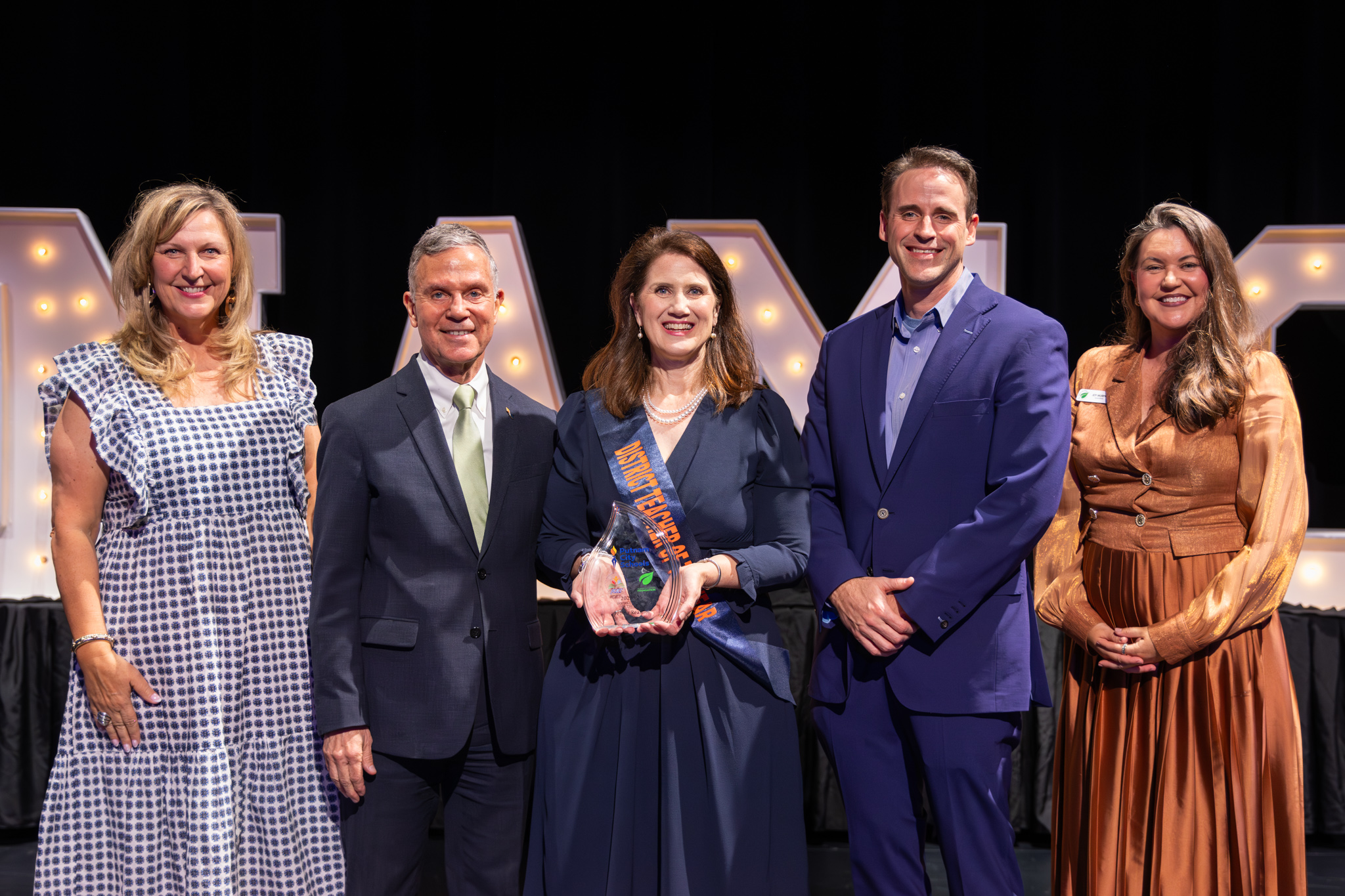 District Teacher of the Year Felicia Reasnor with stakeholders