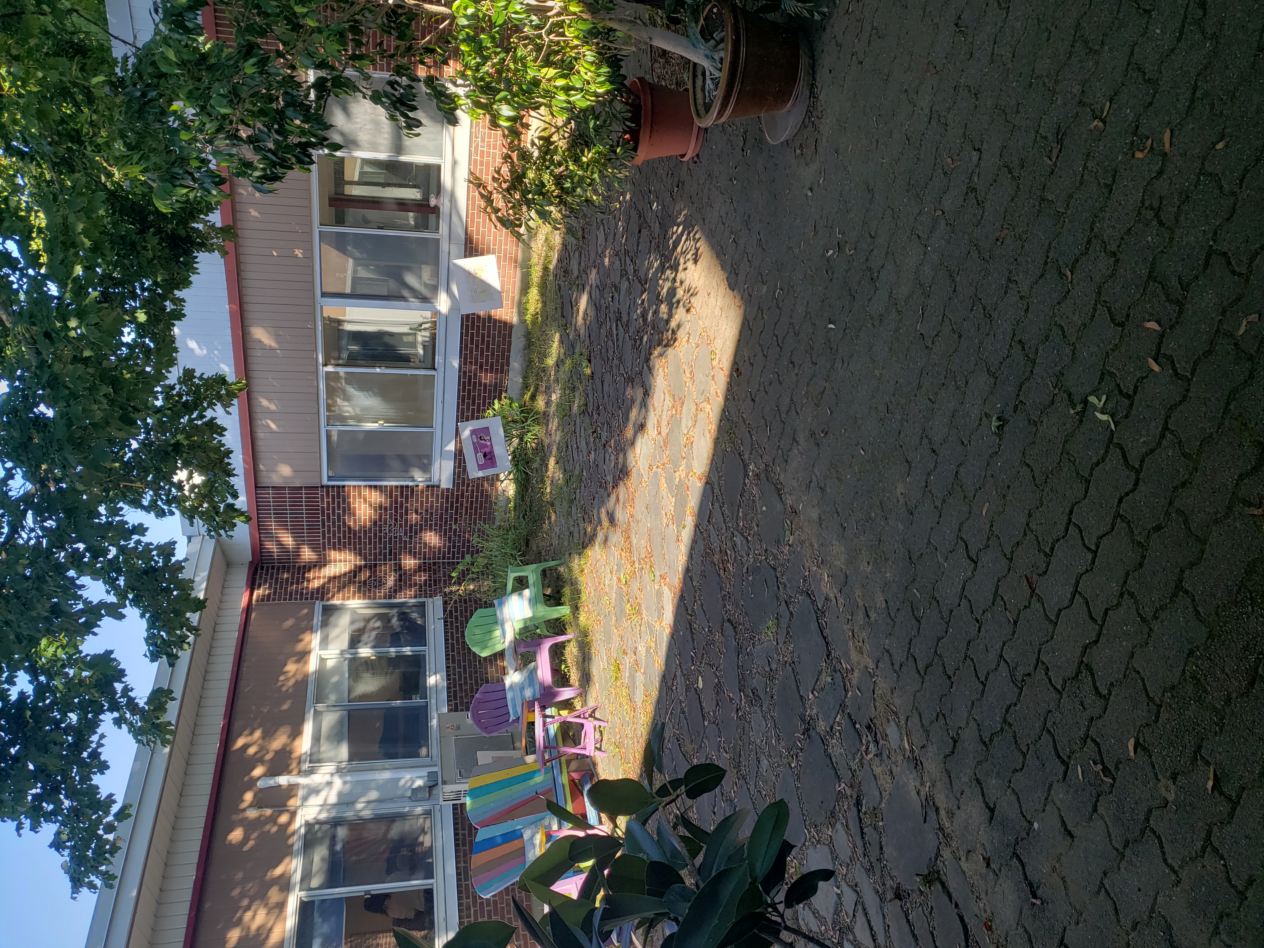 Photo of the courtyard outside of the library with chairs