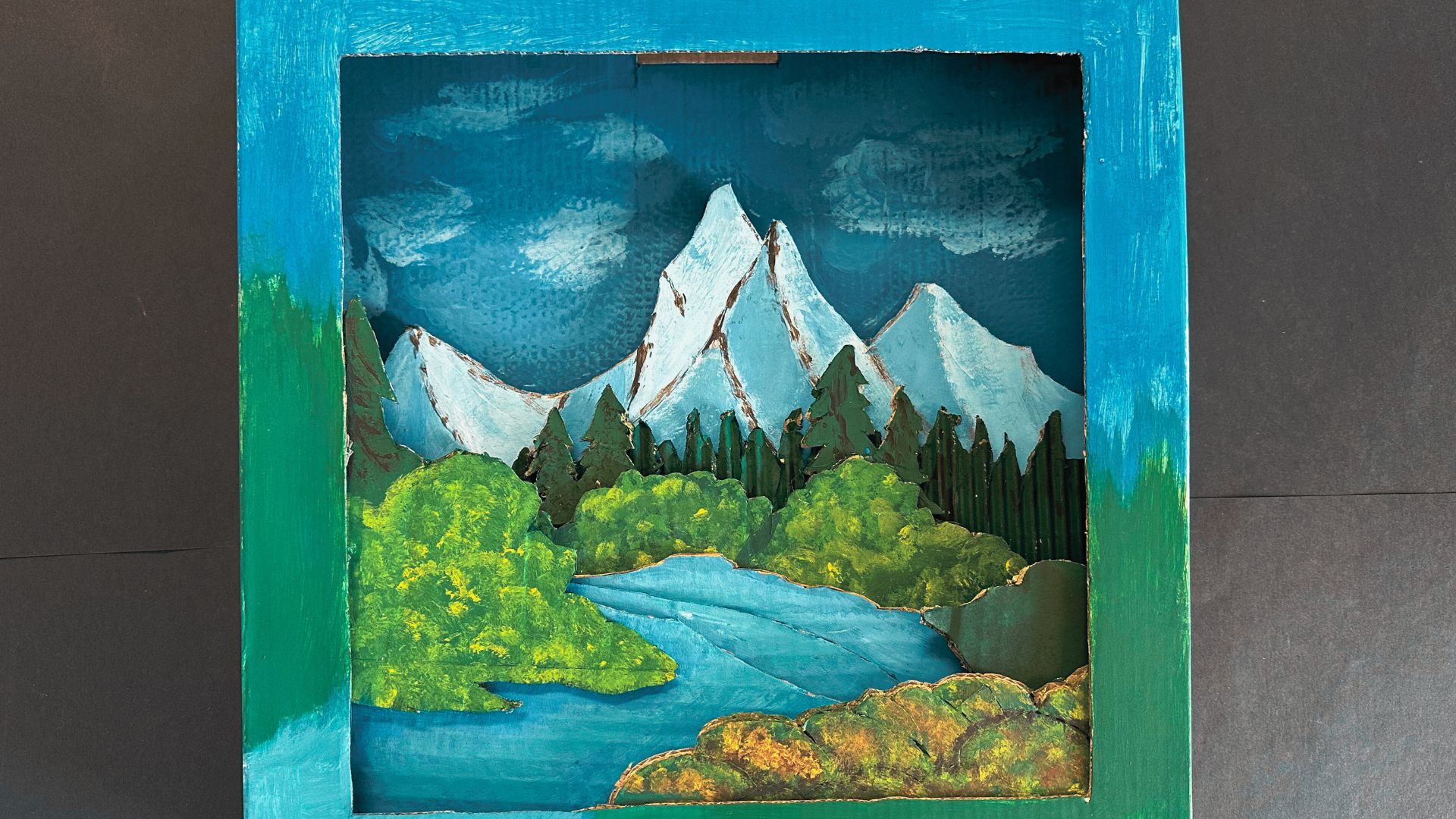 Tyler Ravenscroft artwork of mountains and river