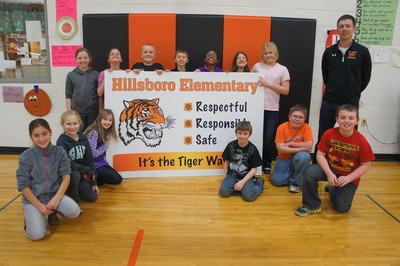Students with a banner