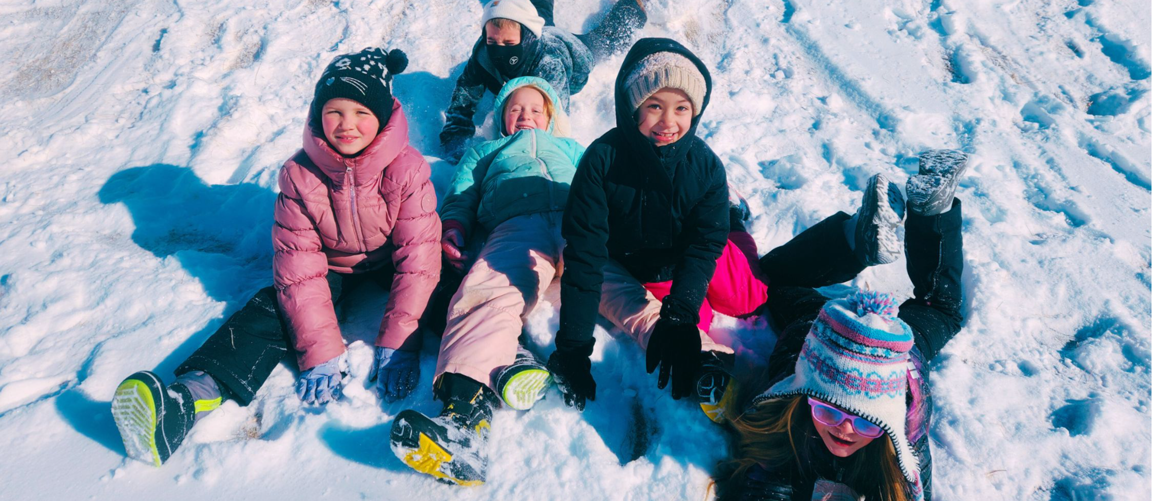 Kids play in snow