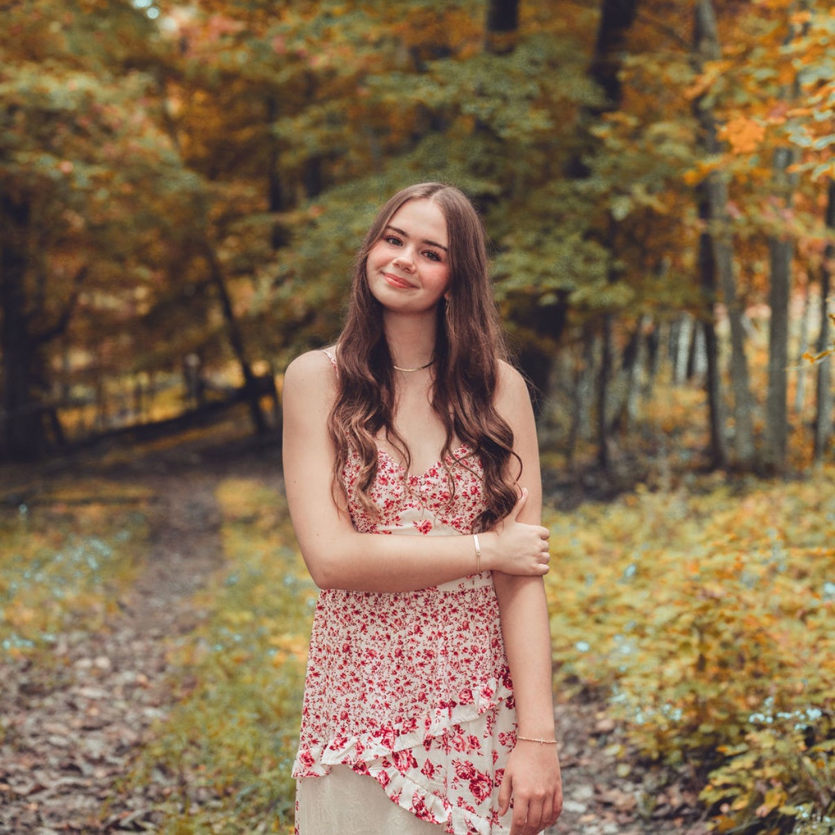 Hayden Bohn senior picture in forest
