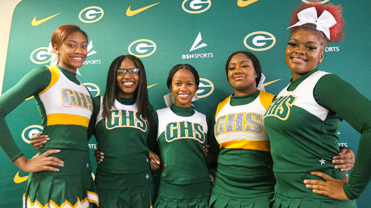 GHS Cheerleaders in front of backdrop