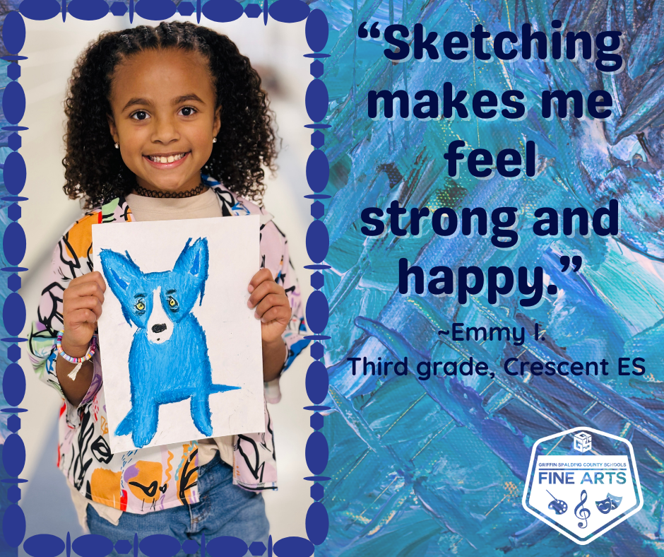 Visual Arts student with artwork.