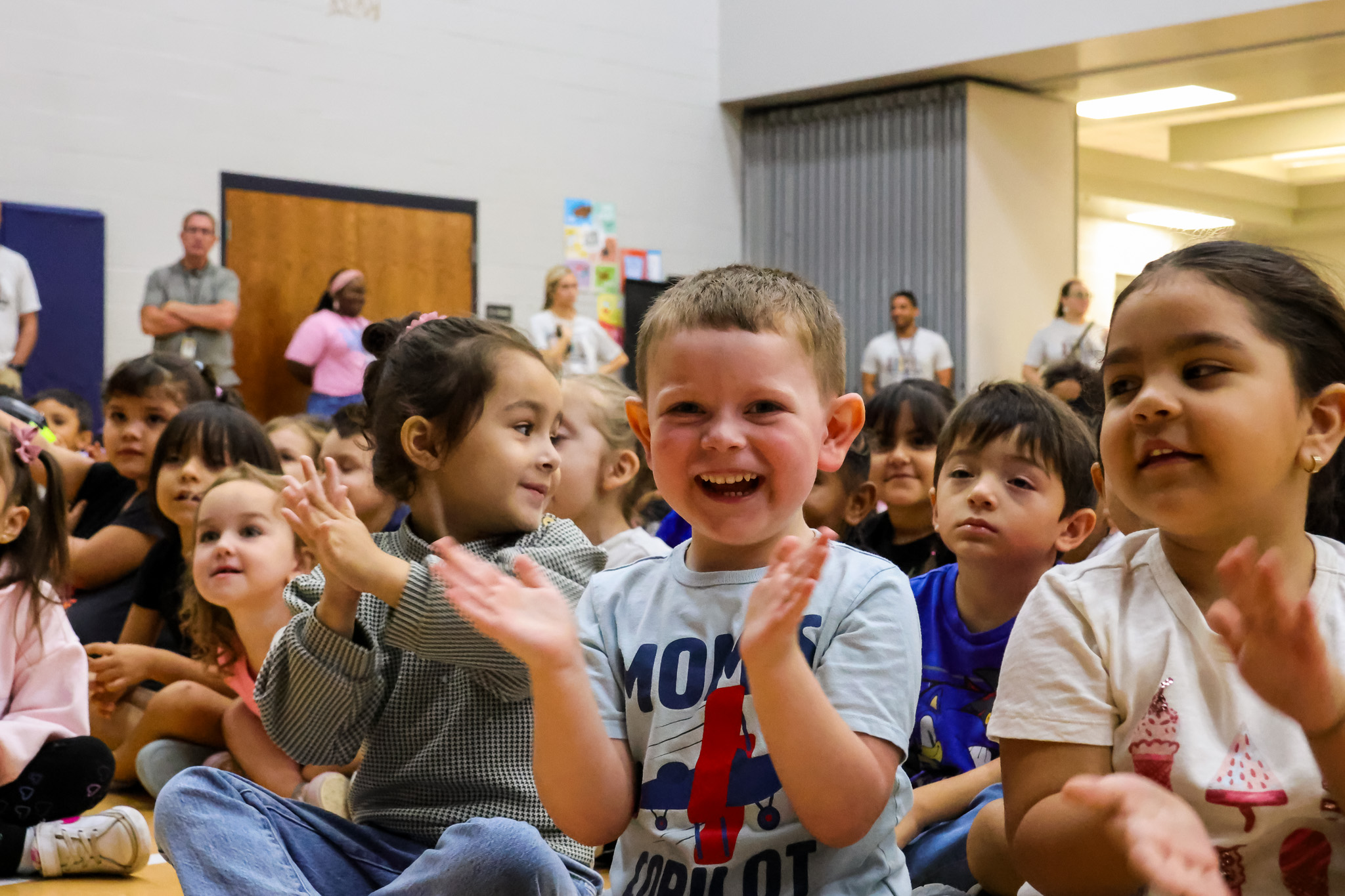 clapping student