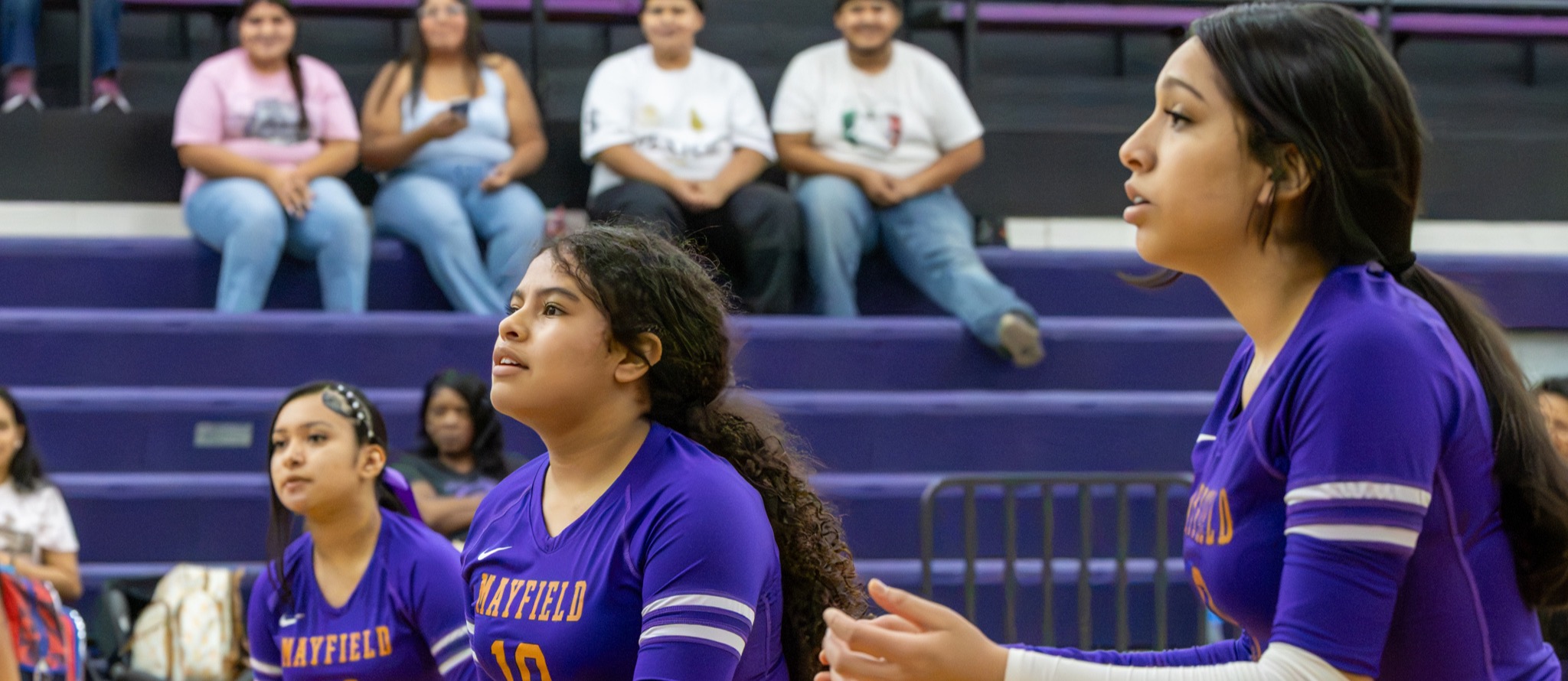Mayfield volleyball players prepare for a serve