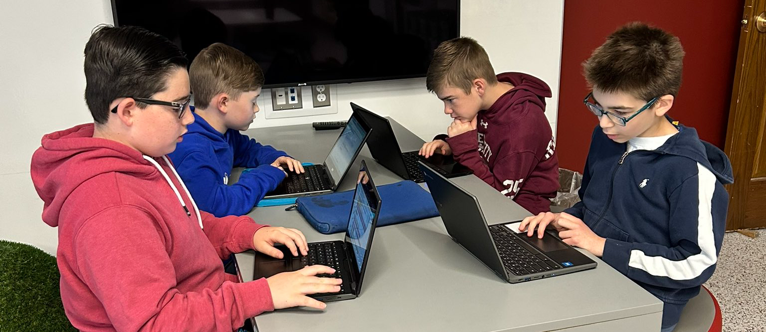 students work on computer