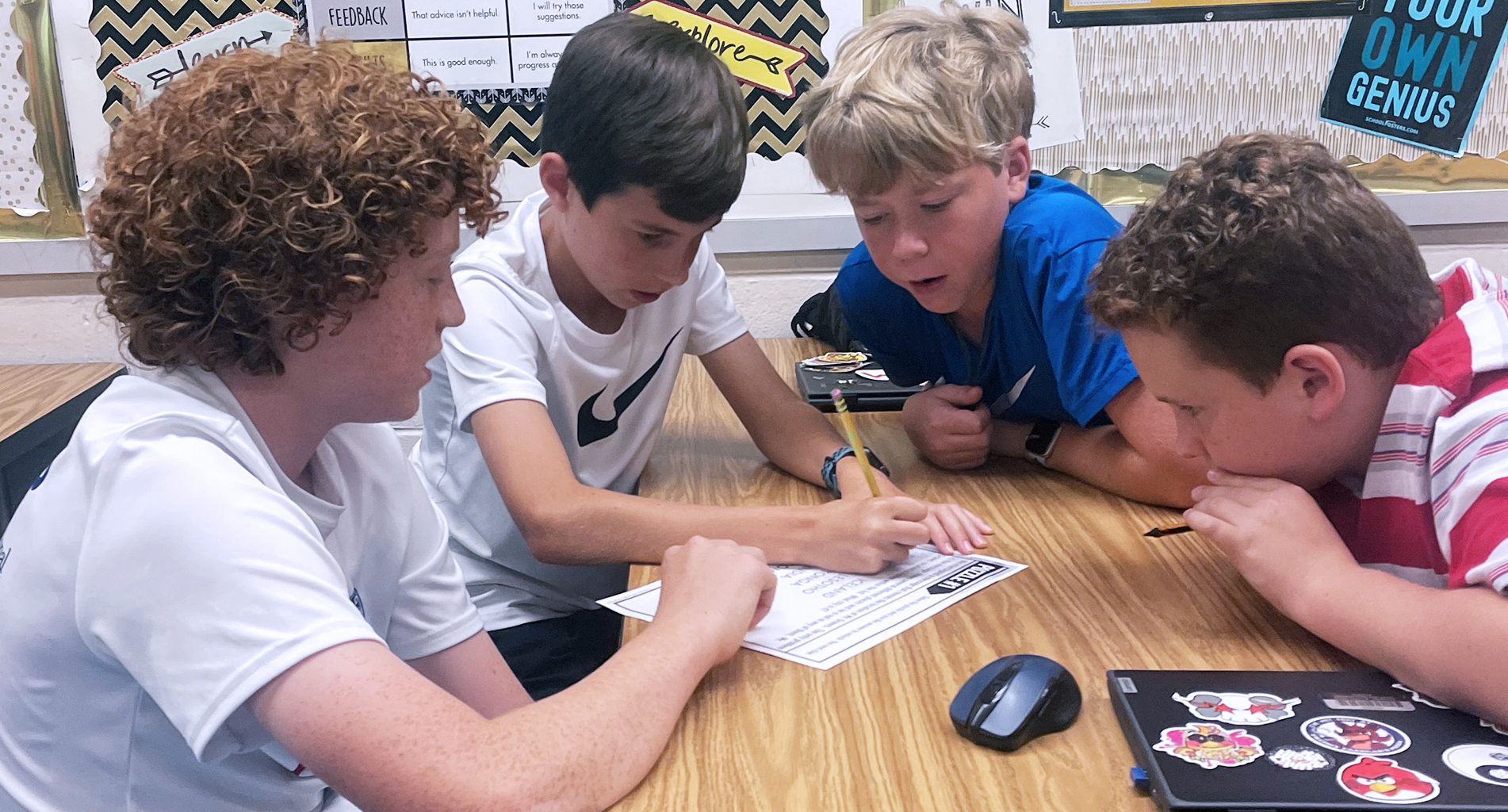 four students working together