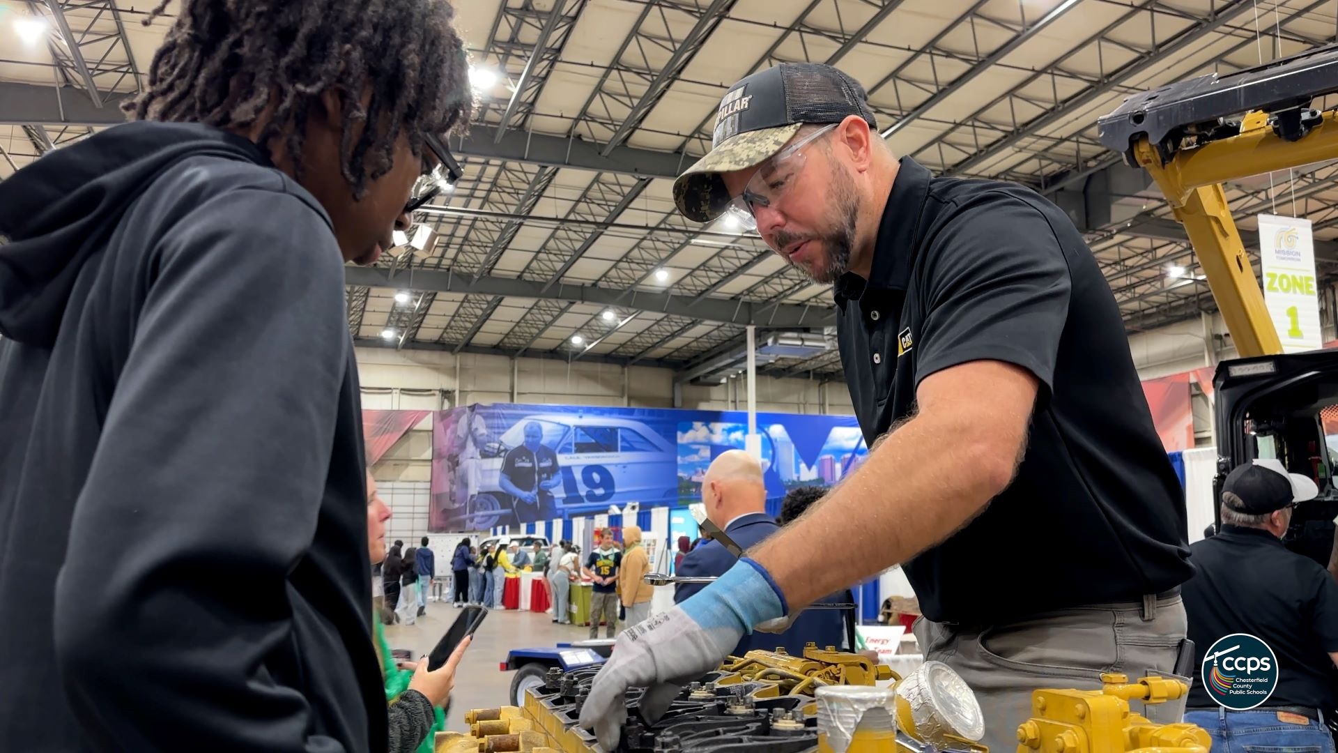 Students observing mechanical devices