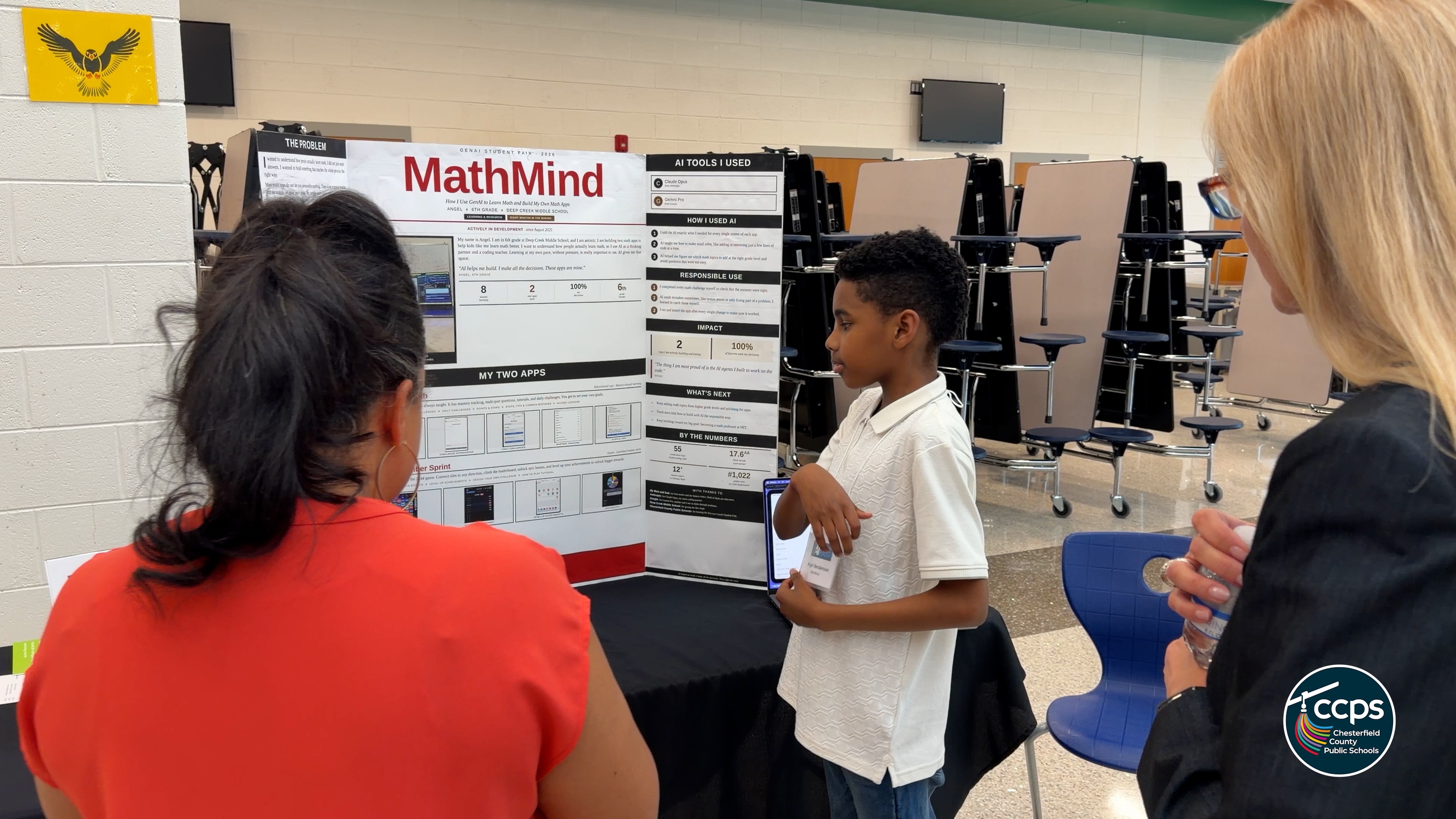 A student in front of a trifold board that reads "Math Mind"