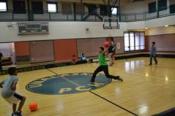 Teens playing dodgeball