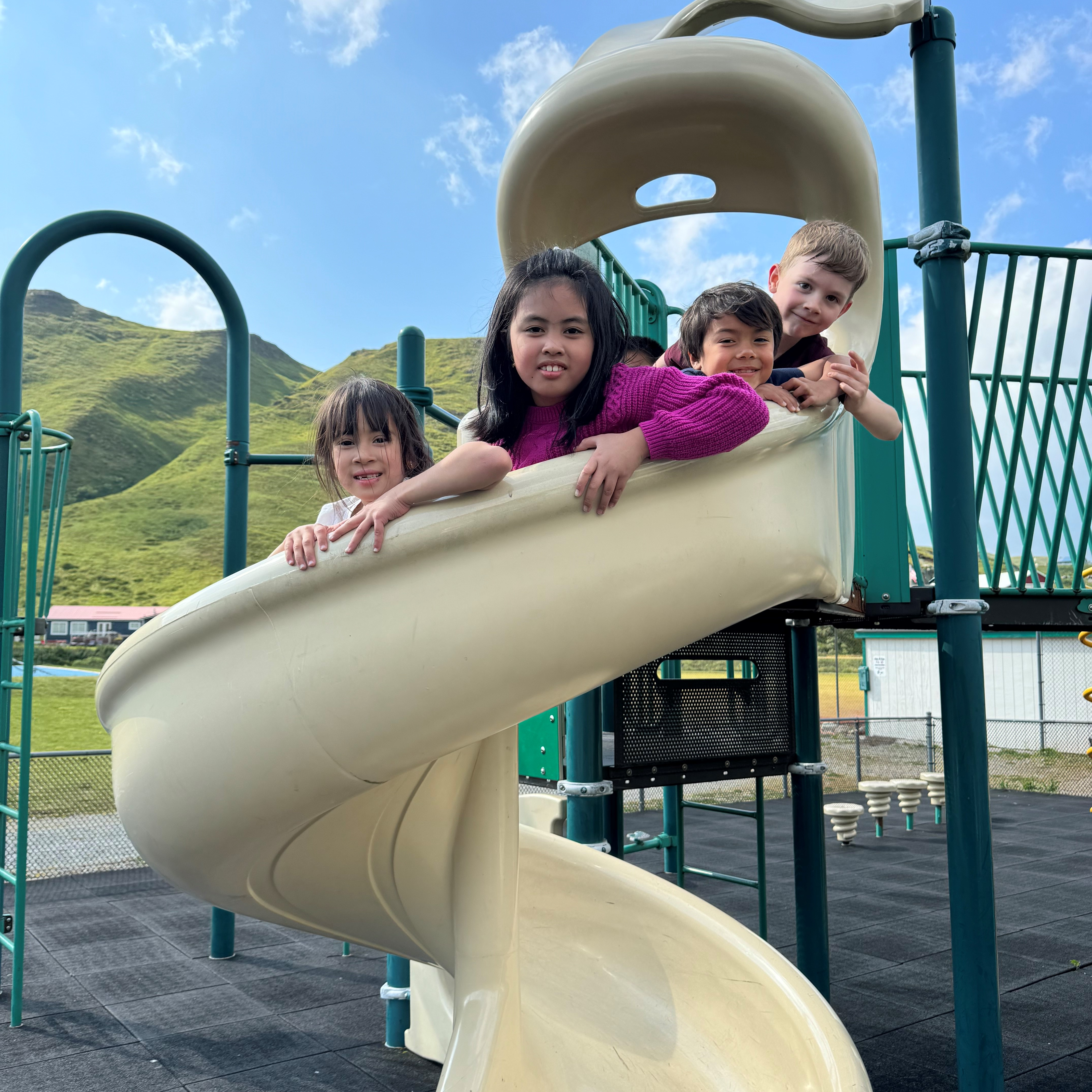 Students playing on swings