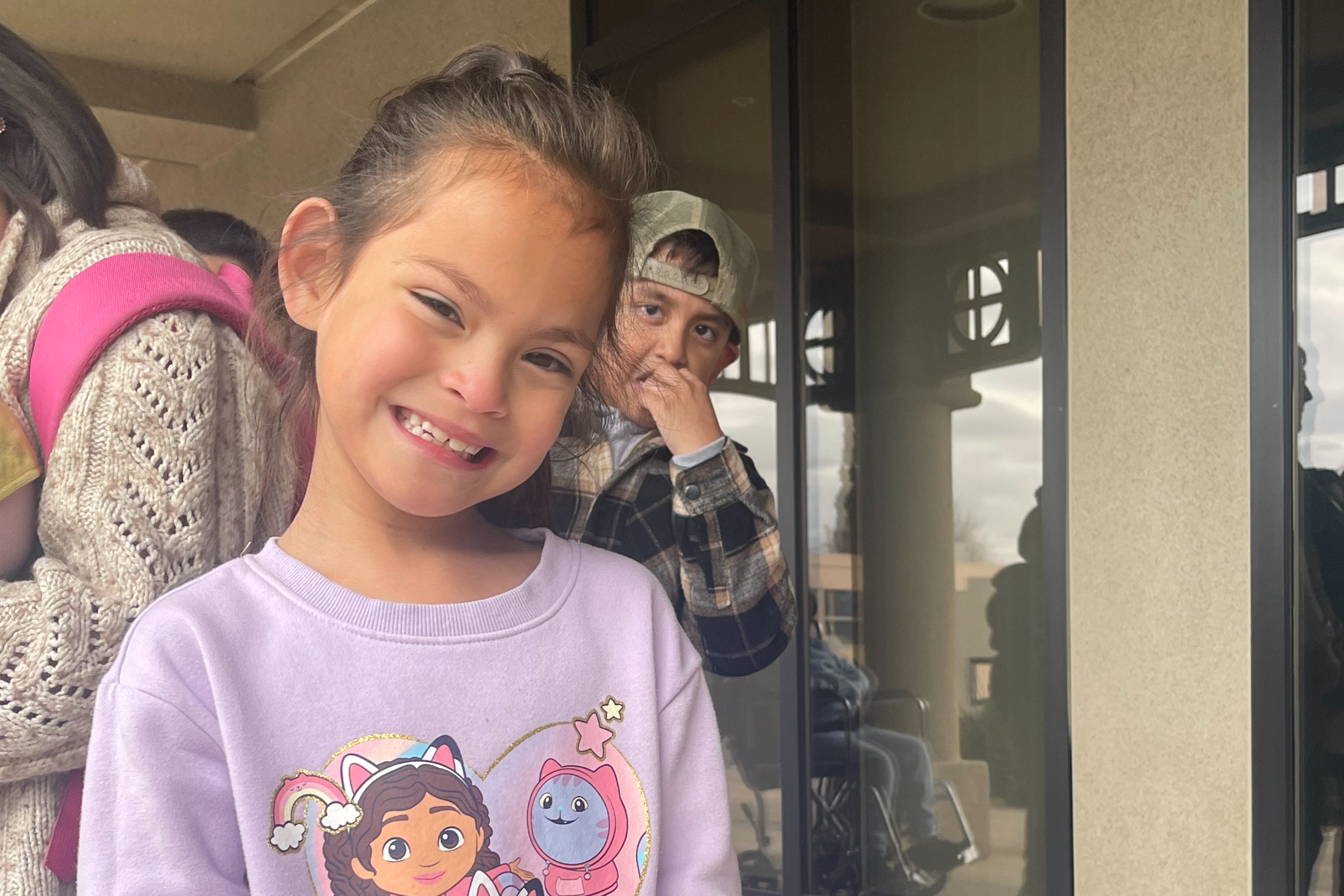 Ms Garza's class went on a field trip to the Police Station. This student was very excited!