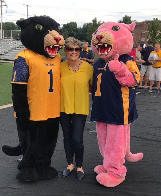 Superintendent with Black and Pink Panther mascots