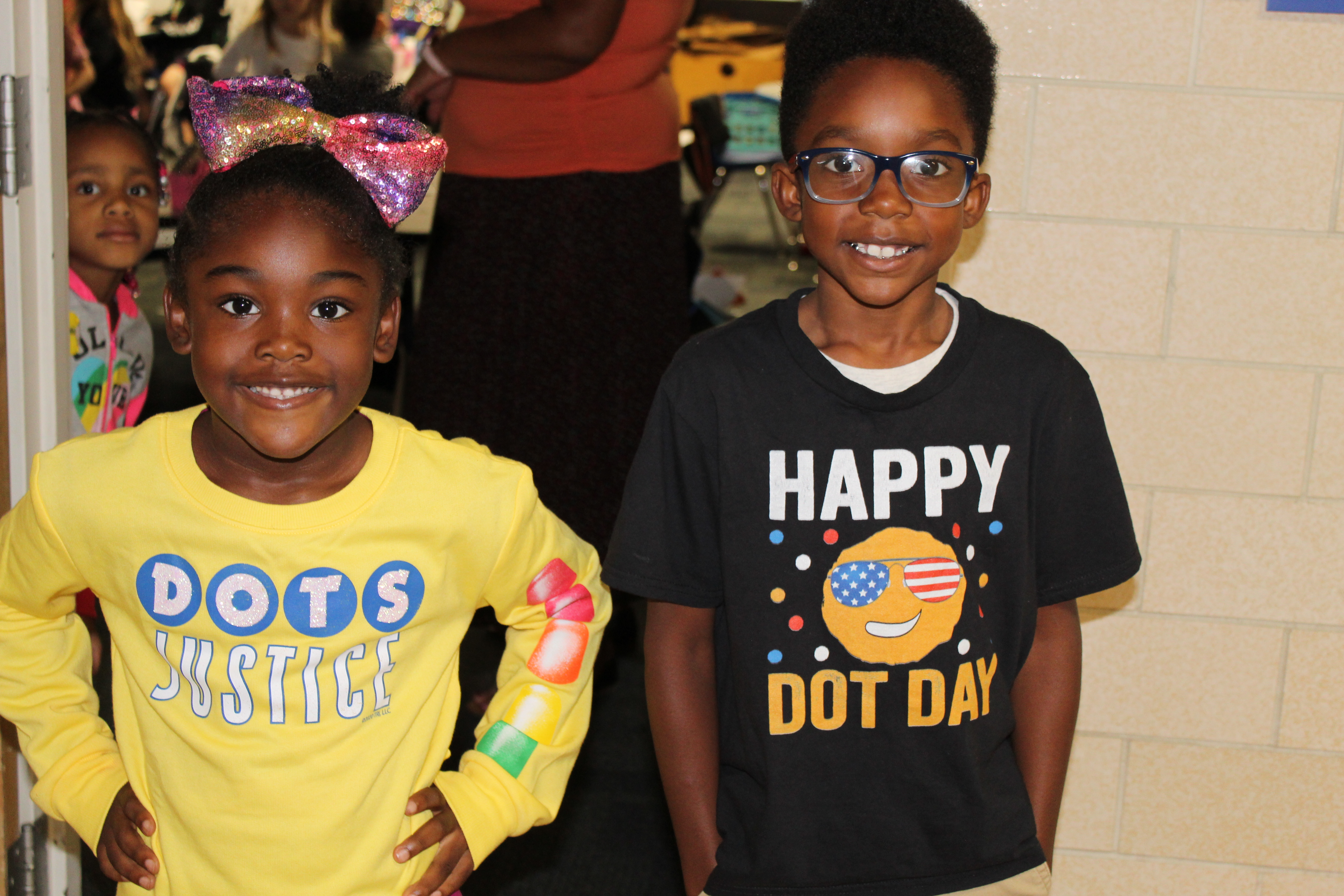 Two students celebrating DOT DAY  with DOT t-shirts
