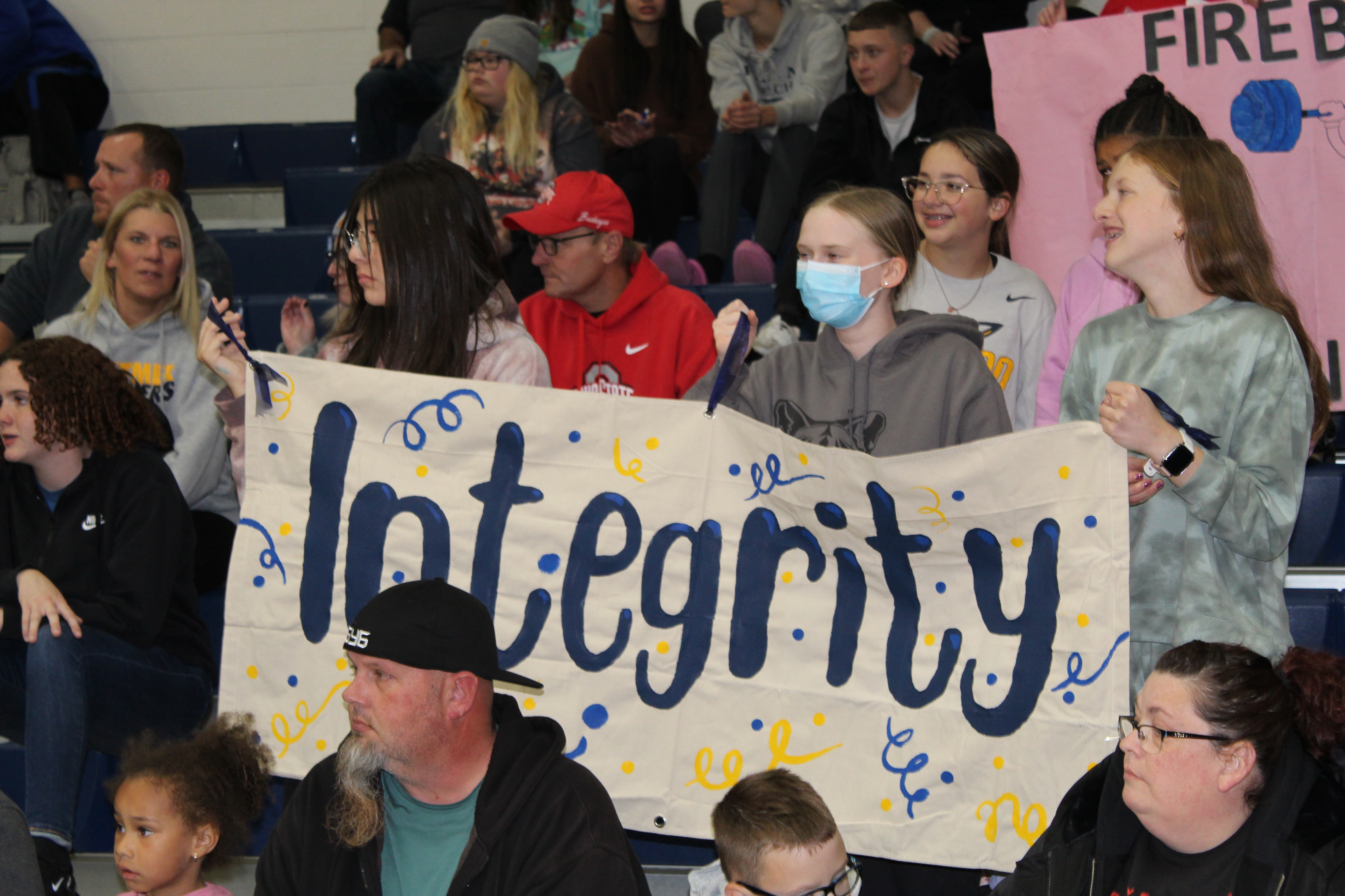 Students holding banner