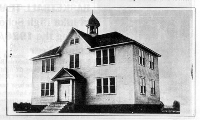 black and white image of historical two story Iuka grade school