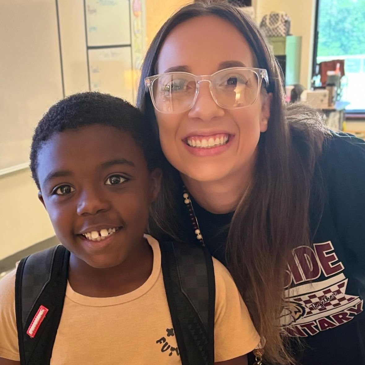 Teacher with student