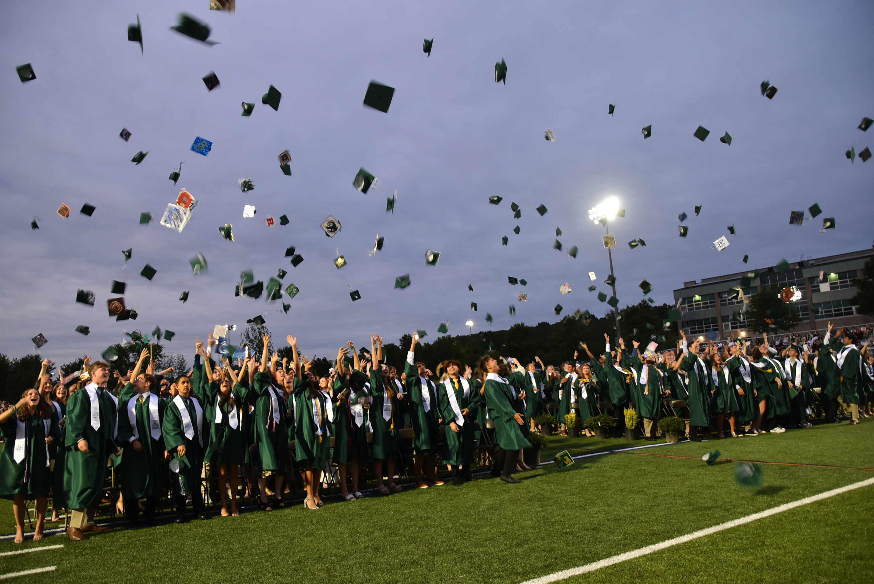 Graduates toss their caps in the air. Congratulations! The #MTHS Class of 2023! Over 275 seniors graduated on June 22. #MustangPride! The ceremony was held on the field in the Mustang Stadium. The event was also broadcast on the Montville Township Public Schools YouTube Channel. WATCH NOW:  montville.net/mthsgraduation