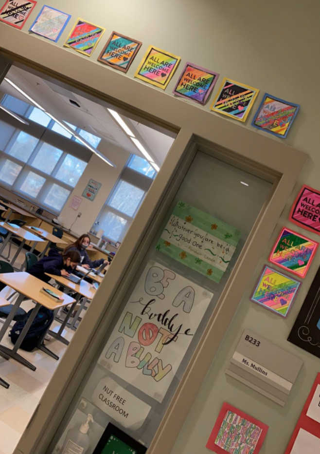 “All are welcome here” signs outside of Ms. Mullins’ classroom at DMS