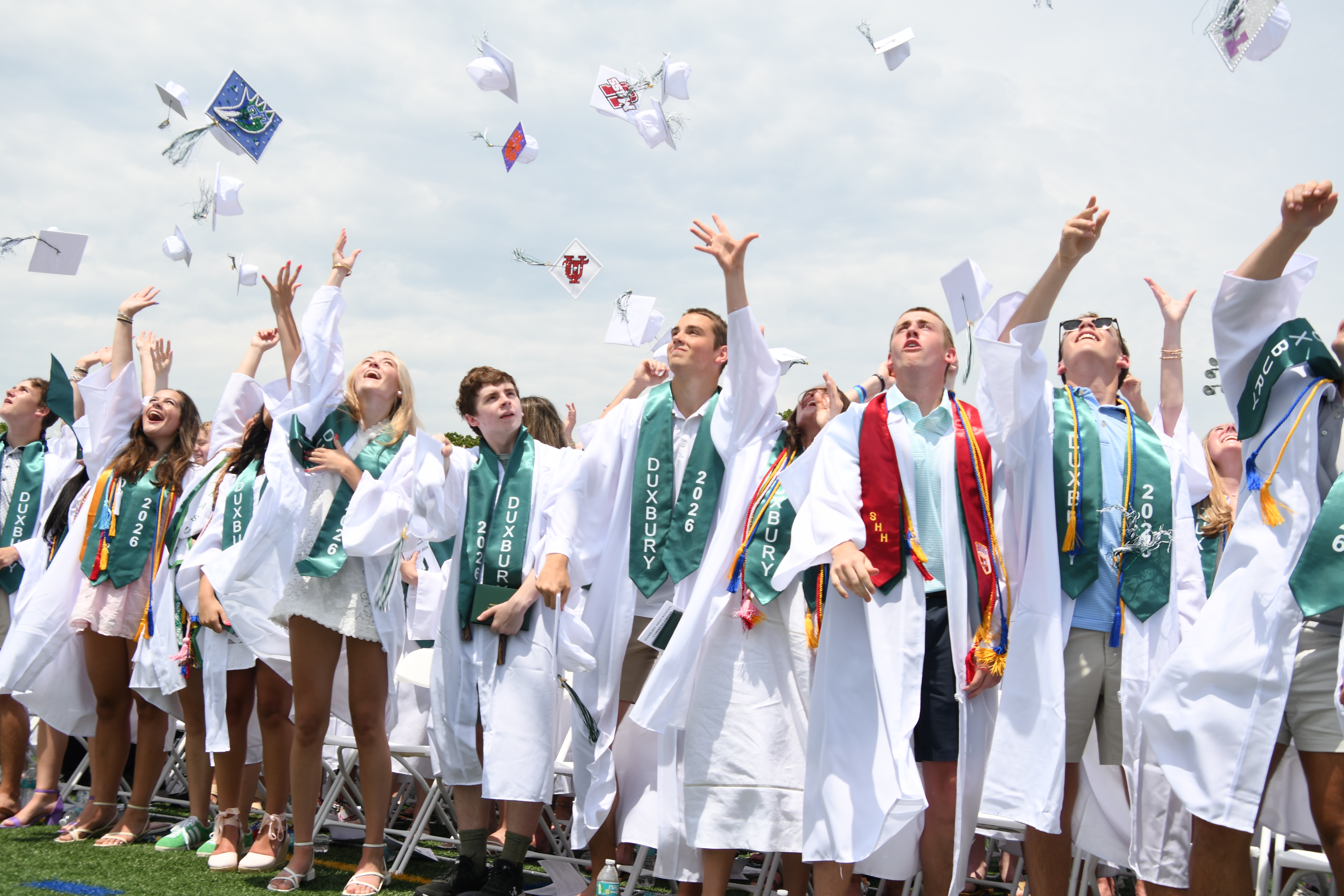 Dux 2026 grads tossing caps in air