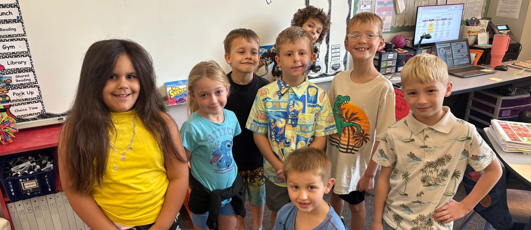 Classroom students pose for a picture
