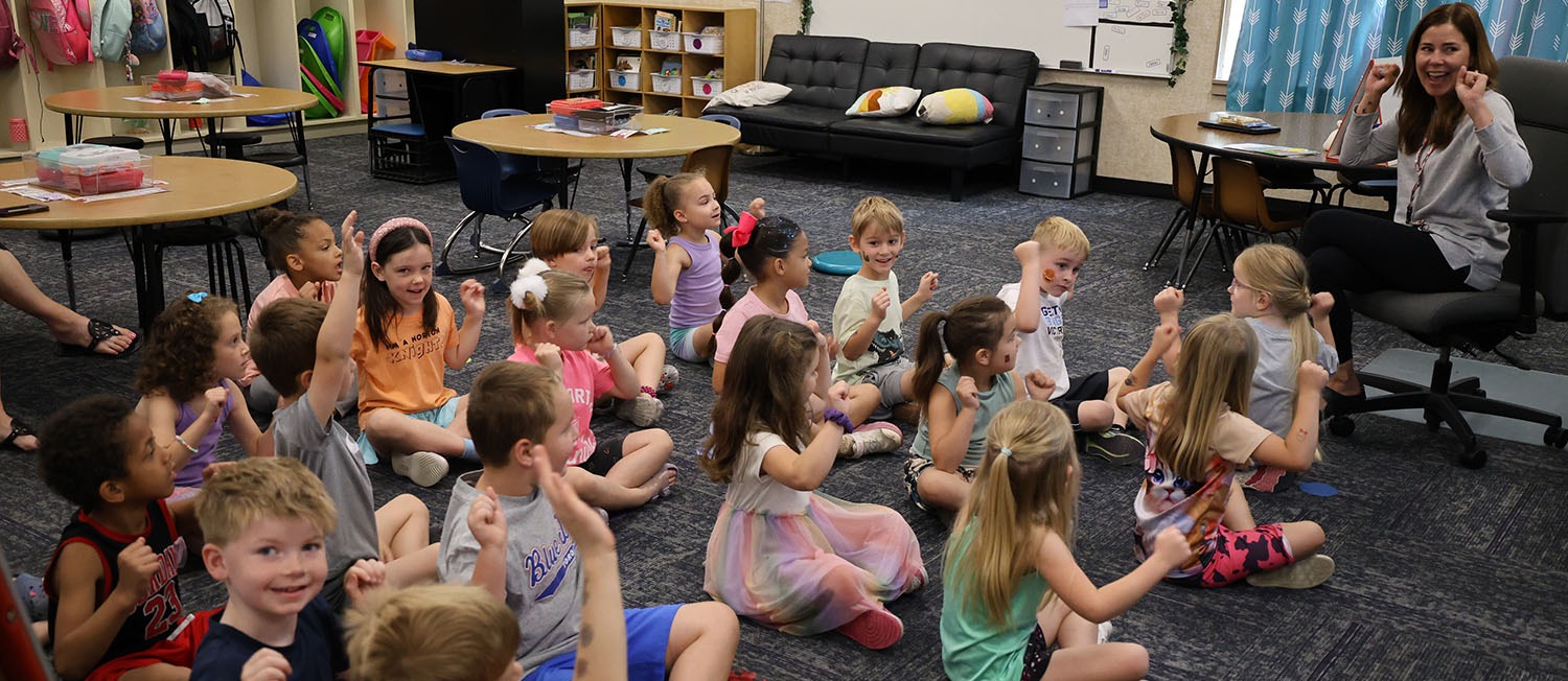 Students learning about their next grade level at Fly Up