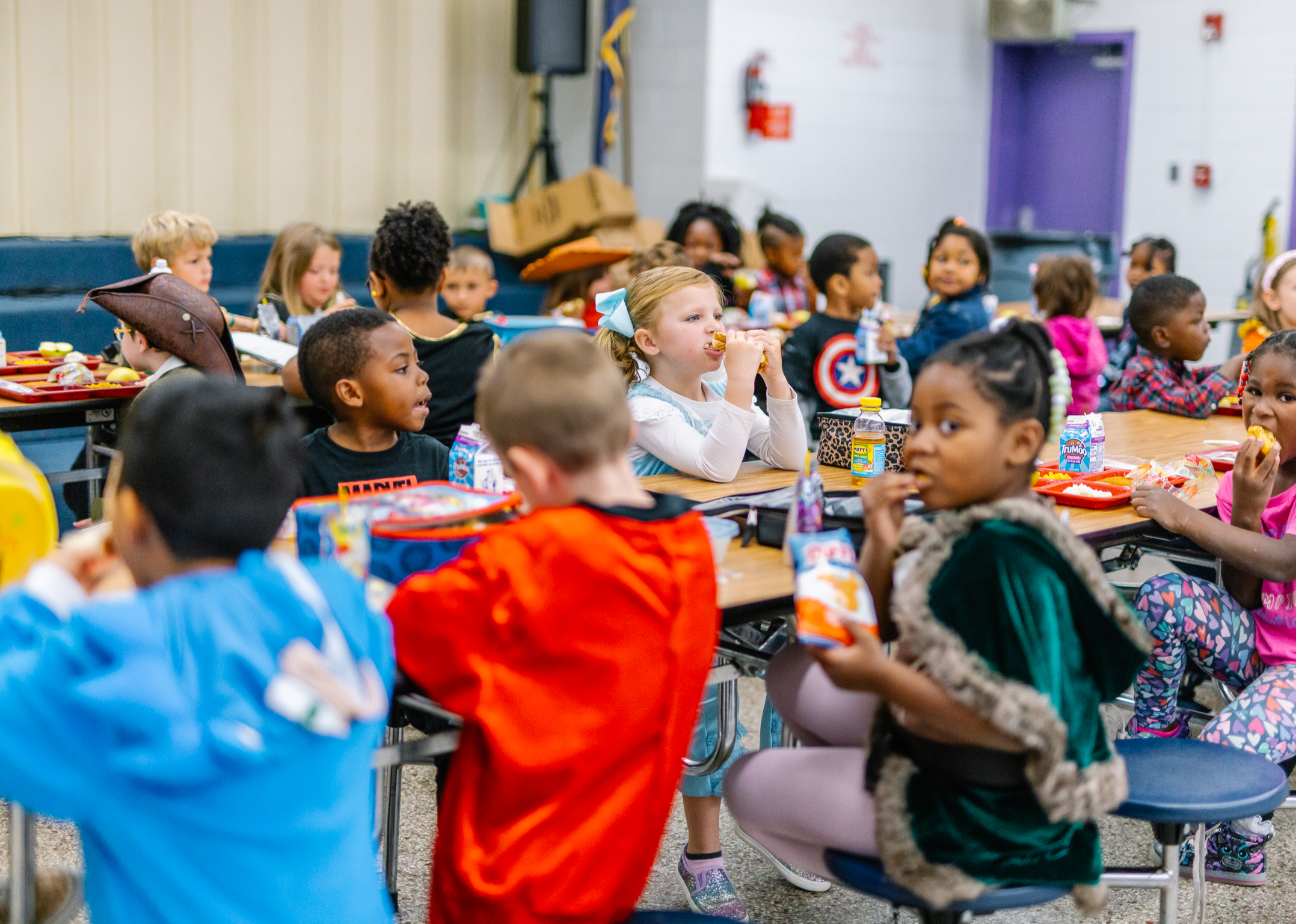 Students in cafeteria eating lunch