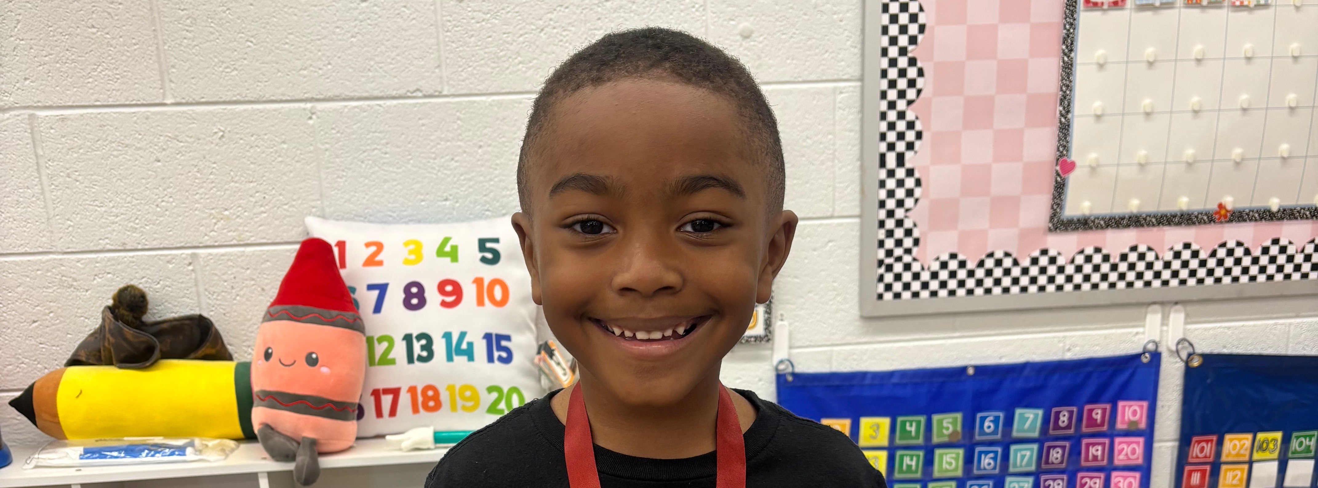 student earning badge