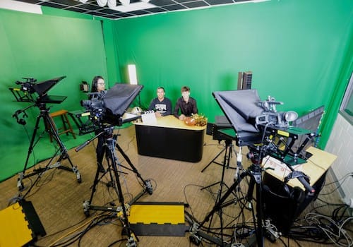 Students in the news room
