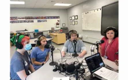 Students recording a podcast 