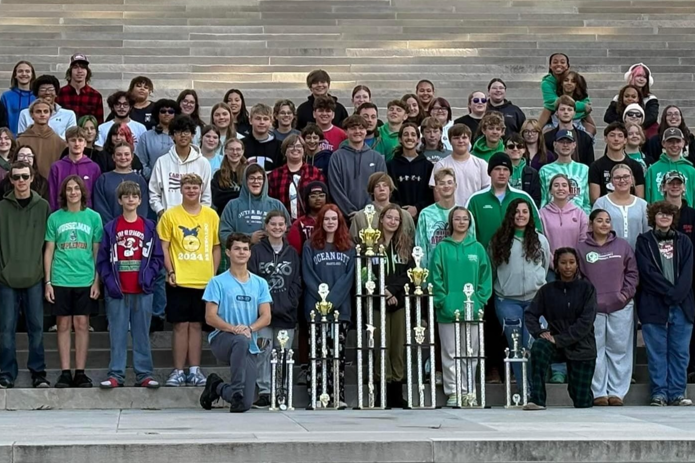 Students with trophies