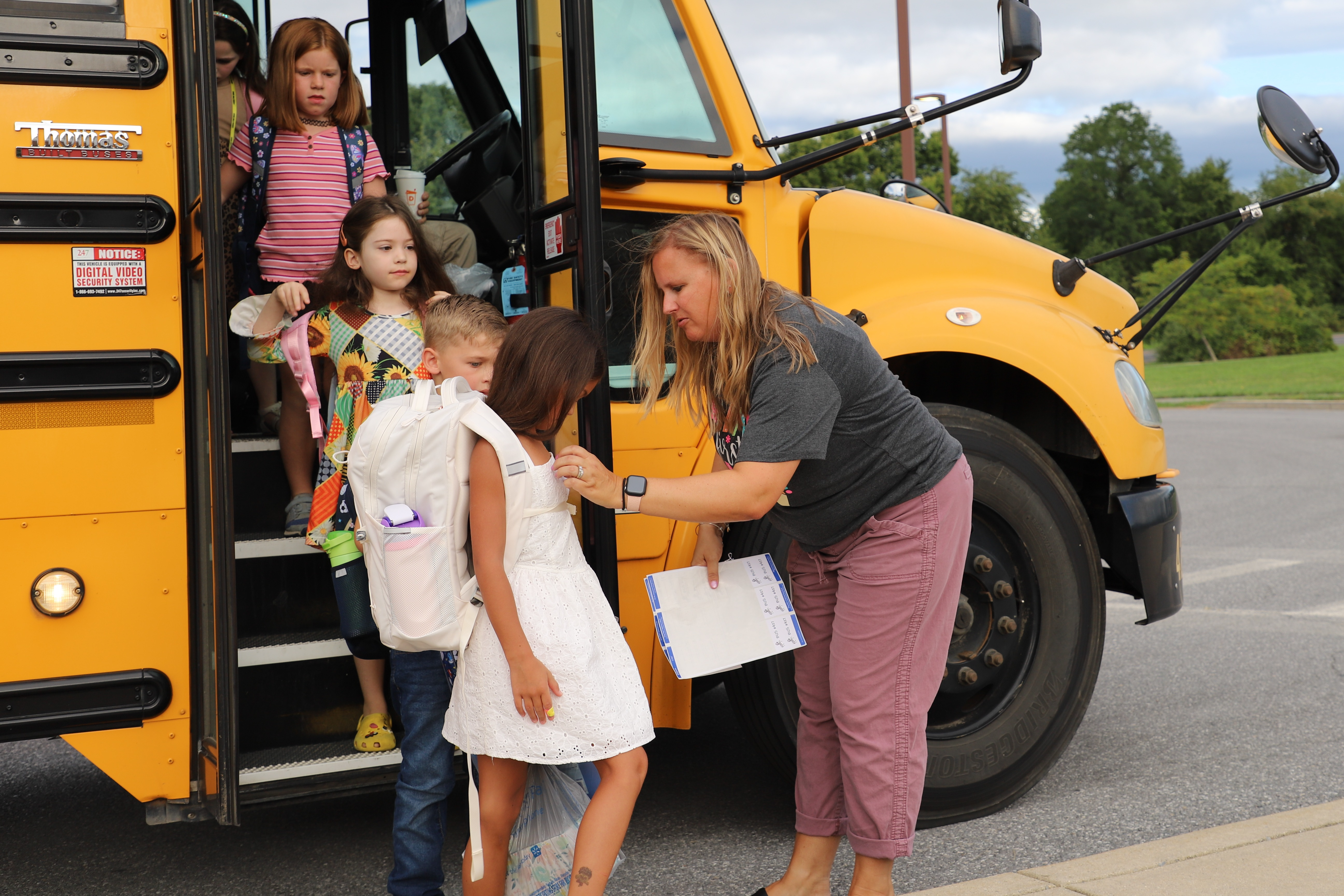 Students getting off bus