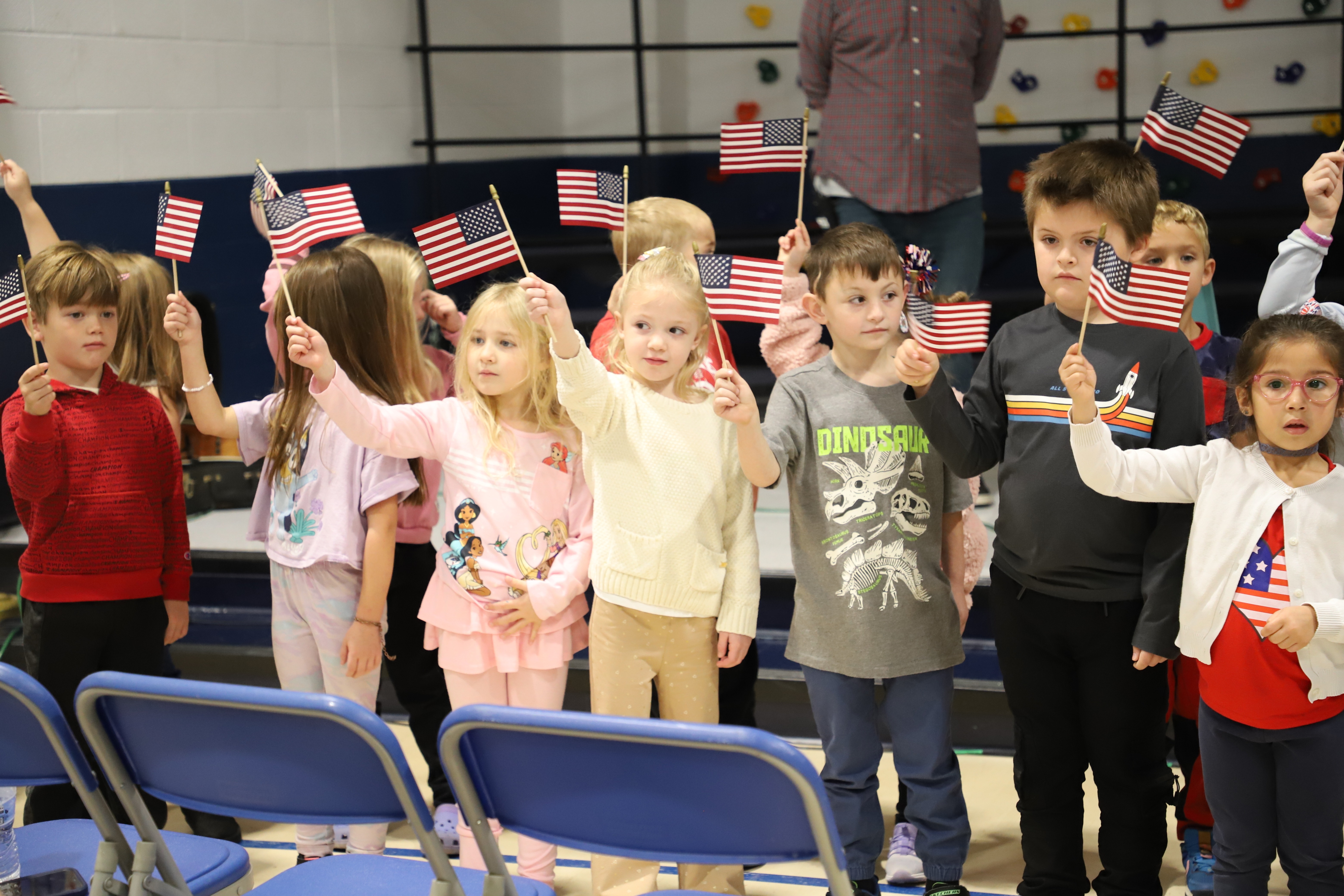 Students waving flags