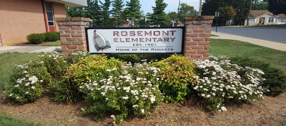 Rosemont elementary sign surrounded by bushessign