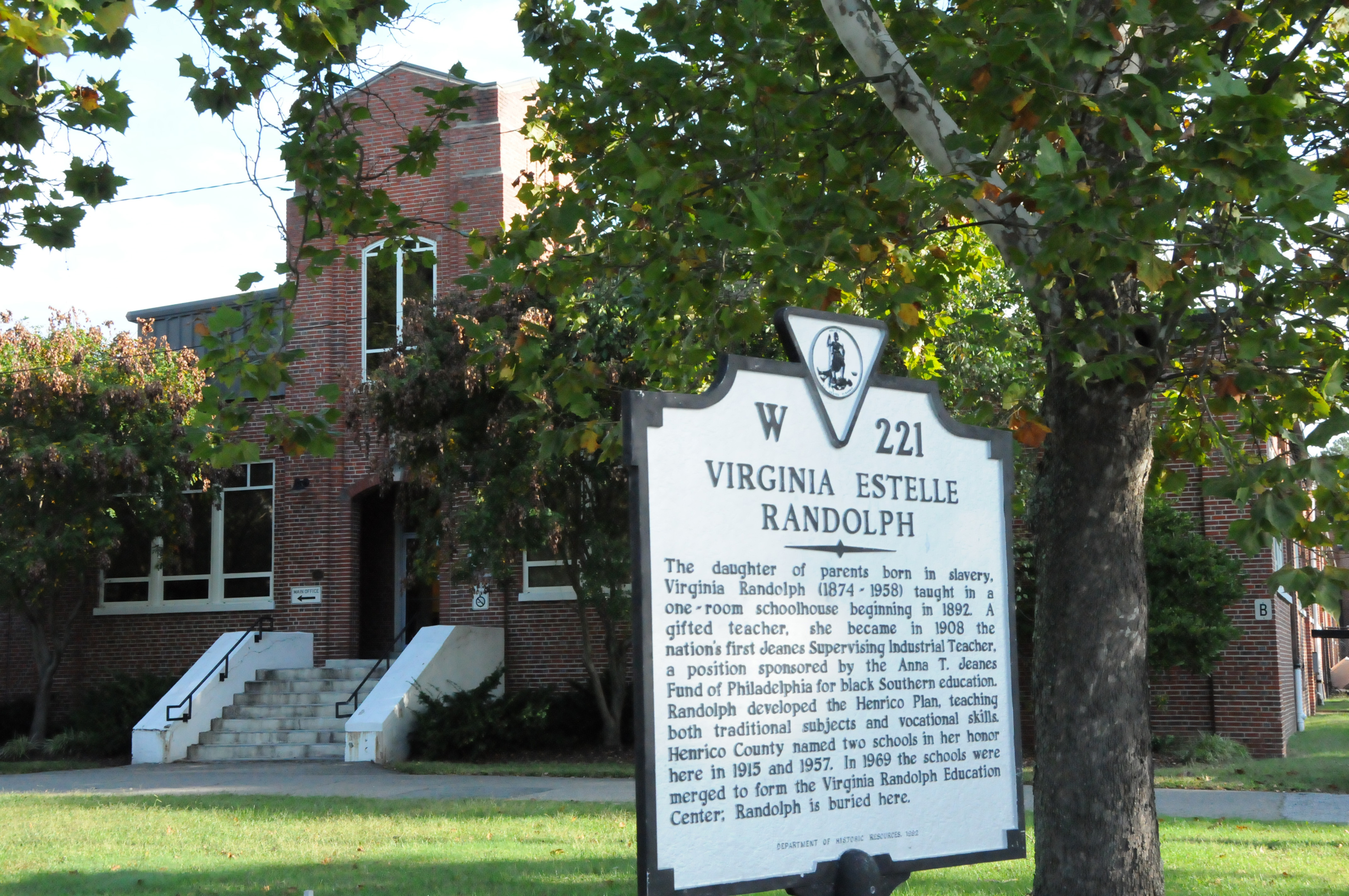 historical sign detailing origins of virginia randolph, school namesake