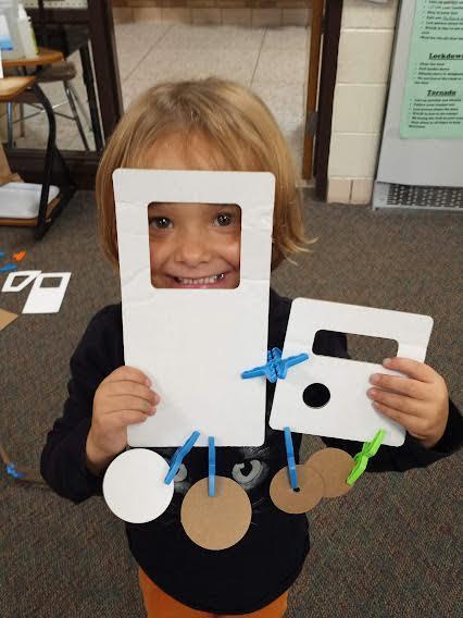 Student exploring with cardboard