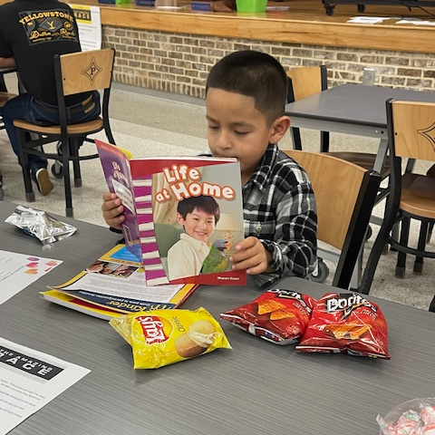 student reading a book.