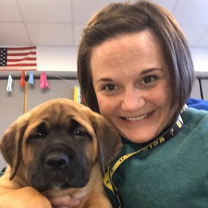 Ms. Krautkramer with her dog and partner