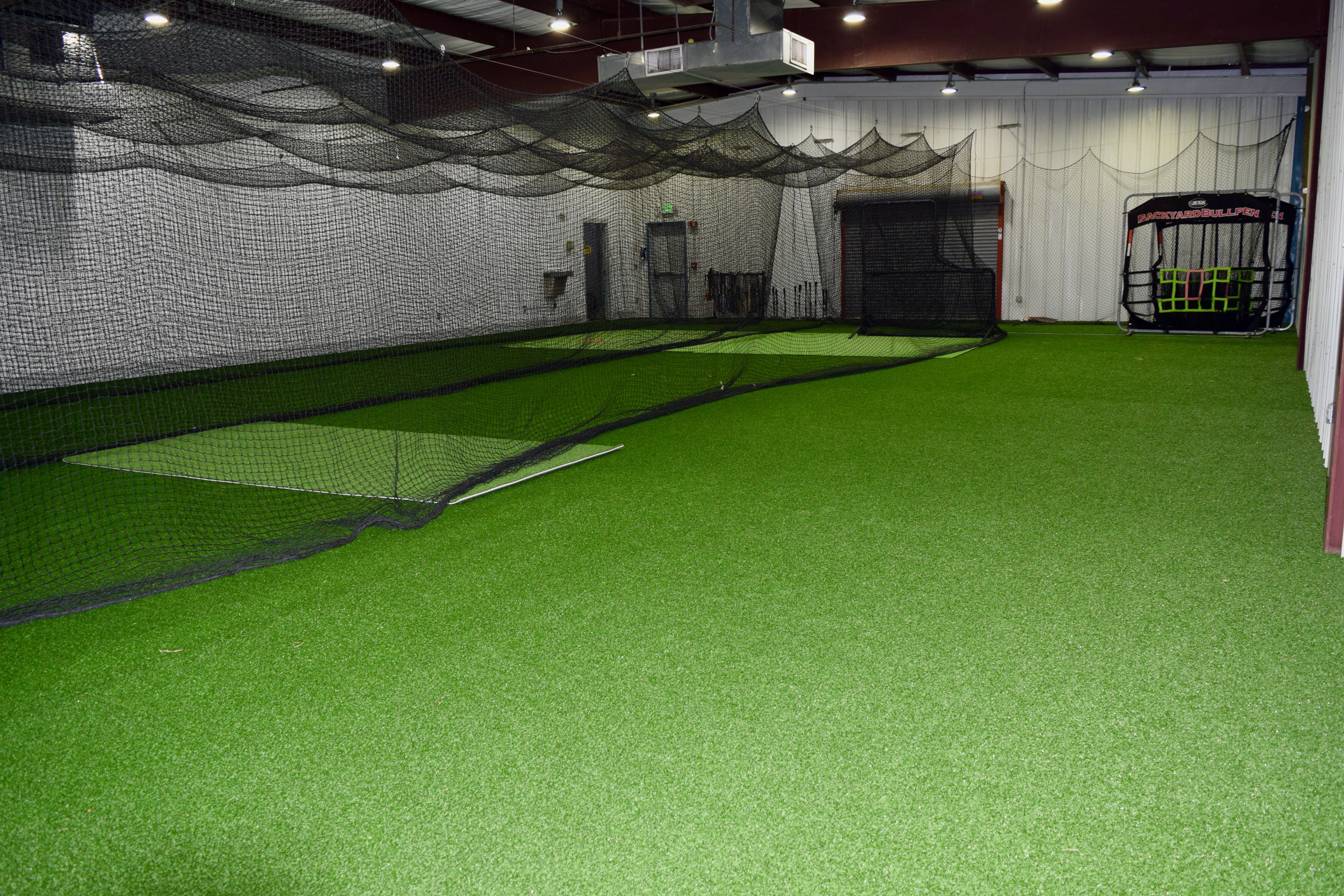 a practice facility with turf floor