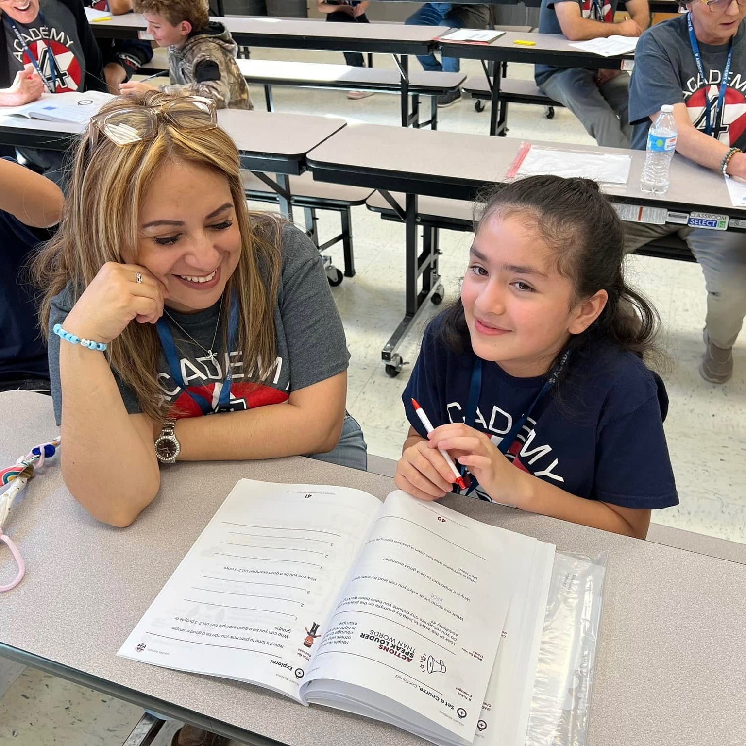 Students working on a textbook