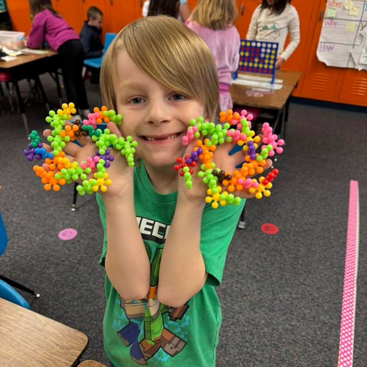 Kid holding craft