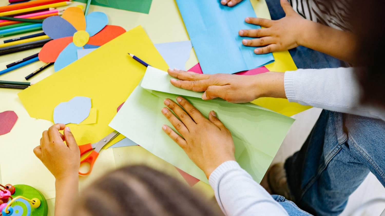 children's hands make crafts