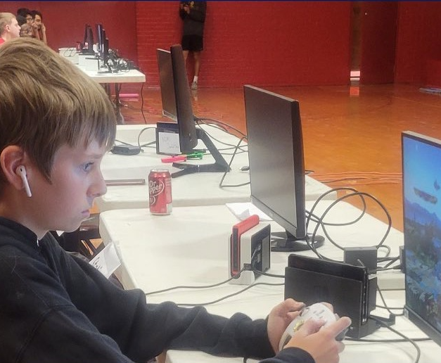 a boy plays a video game