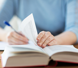 Person turning book page